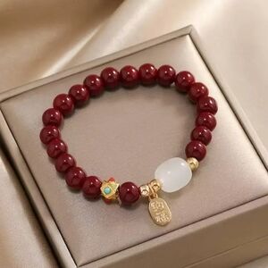 Elegant Red cinnabar Beaded Bracelet with Gold Accents